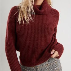 A garage fuzzy burgundy turtleneck